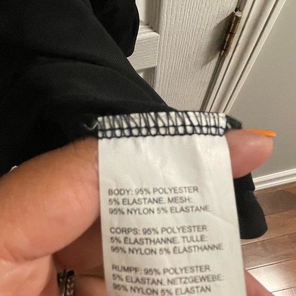 Gorgeous long sleeve semi sheer black top. Only worn twice. - Picture 4 of 4